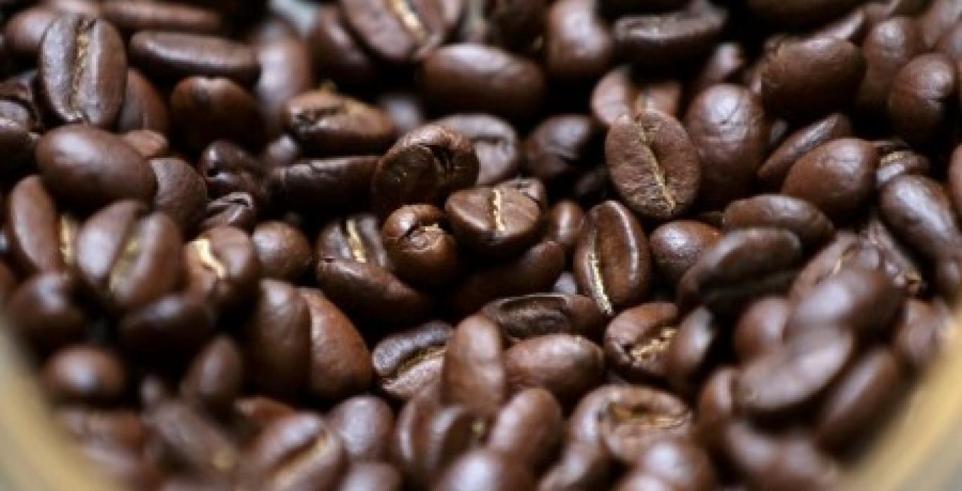 SOFTS-New York coffee jumps nearly 8% on weaker dollar, roaster buying